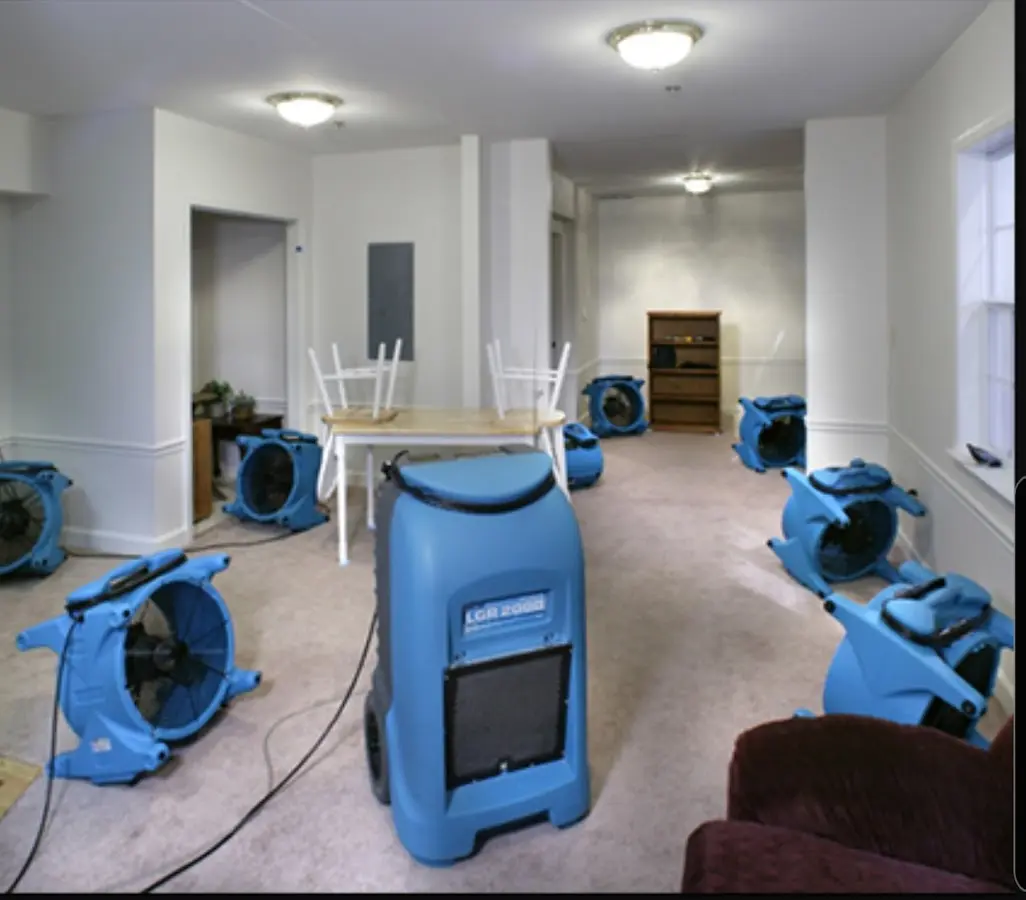 Air movers and dehumidifier setup for Water Extraction & Removal in West Manchester